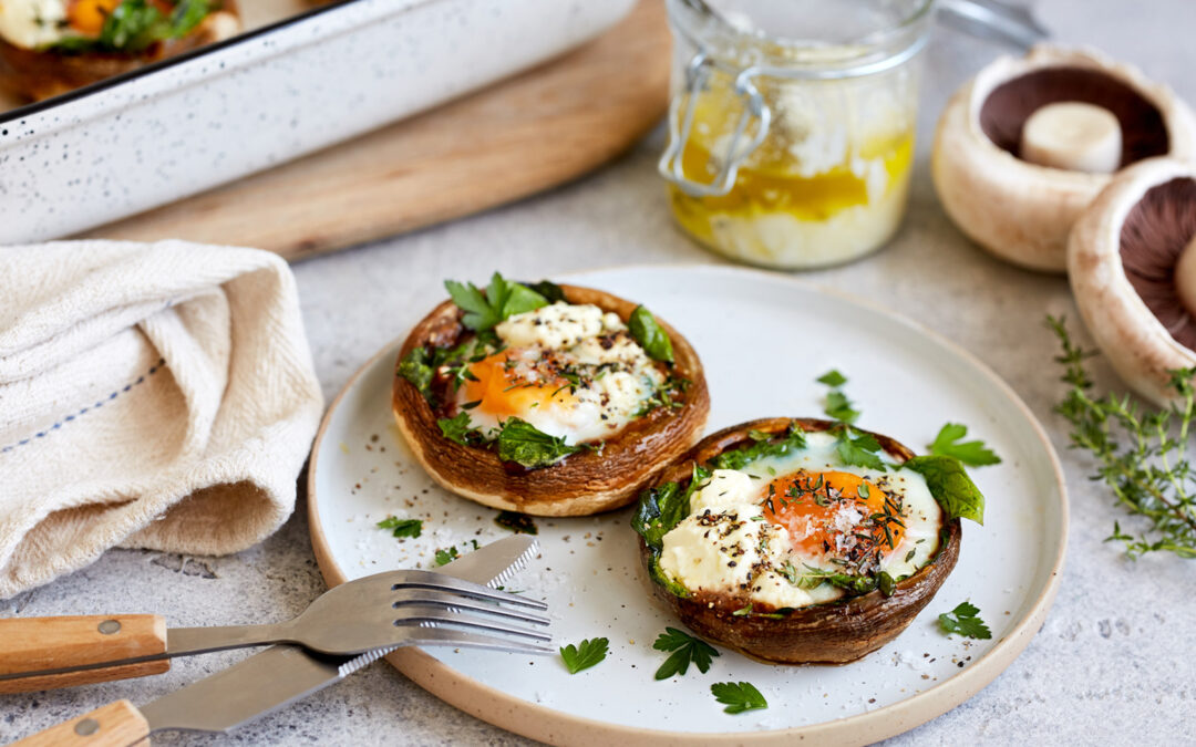 Baked breakfast mushrooms stuffed with spinach, feta and egg